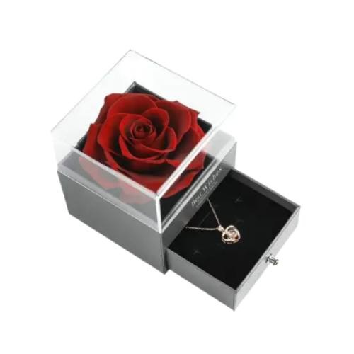 gold rose in the acrylic box 